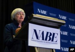 FILE - Federal Reserve Chair Janet Yellen speaks at an economics conference, Sept. 26, 2017, in Cleveland, Ohio.