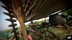 A soldier from Burundi serving with the African Union Mission in Somalia (AMISOM) is seen manning a frontline position in territory recently captured from insurgents in Deynile District along the northern fringes of the capital Mogadishu, November 18, 201