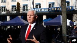United States Vice President Mike Pence briefs the media during the Munich Security Conference in Munich, Germany, Saturday, Feb. 16, 2019.