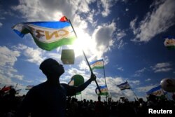Supporters of the the National Congress for Timorese Reconstruction (CNRT) political party attend a rally ahead of parliamentary elections in Dili, East Timor, July 18, 2017.