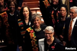 Democratic female members of Congress, wearing black to support the #MeToo movement and buttons referring to 1944 rape victim Recy Taylor, arrive on the House floor to watch U.S. President Donald Trump deliver his State of the Union address.