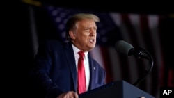 President Donald Trump speaks during a campaign rally at MBS International Airport, Sept. 10, 2020, in Freeland, Mich. 