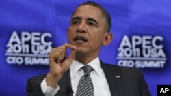 President Barack Obama answers questions from Boeing Chief Executive Officer Jim McNerney as he attends the APEC CEO Summit in Honolulu, Hawaii, Nov. 12, 2011.