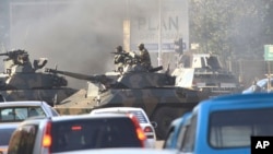 FILE: Military tanks in Harare, Wednesday, Aug, 1, 2018. r