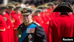 FILE - Britain's Prince Andrew reviews Chelsea Pensioners during the Founder's Day Parade at the Royal Hospital Chelsea in London, Britain, June 4, 2015. 