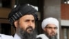 Ketua perundingan Taliban Afghanistan Mullah Abdul Ghani Baradar (depan) usai pembicaraan damai dengan para politisi senior Afghanistan di Moskow, Rusia, 30 Mei 2019. (Foto: Reuters)