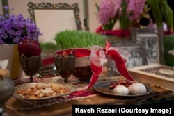 Garlic, apples, and 'sabzeh' are part of a Persian "haft seen"