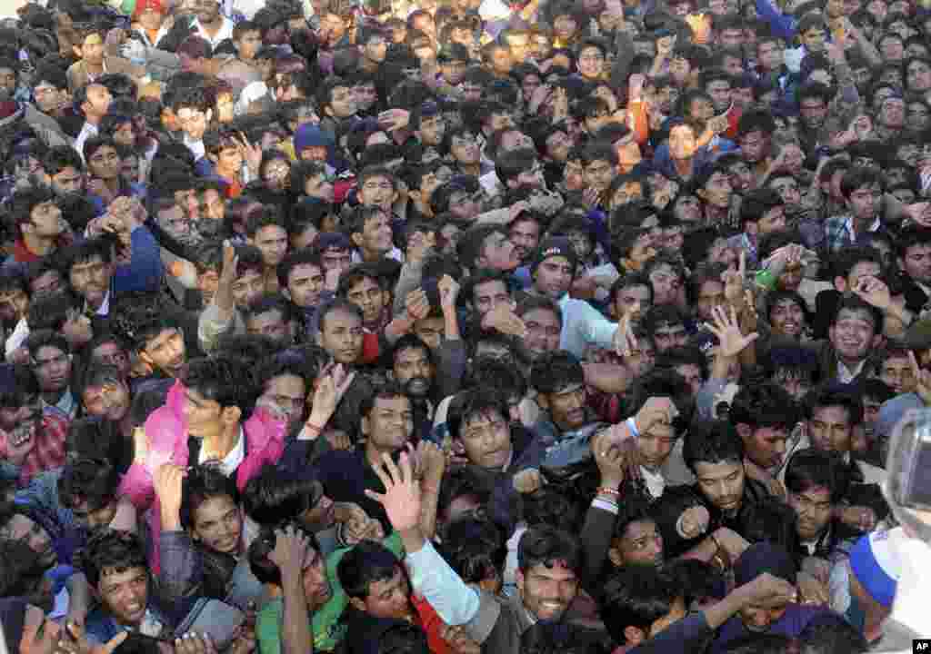 Indian cricket fans jostle for tickets for the second Twenty20 cricket match between India and Pakistan in Ahmadabad, India, December 26, 2012.