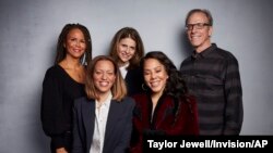 FILE - Sil Lai Abrams, back row from left, director Amy Ziering, director Kirby Dick, Drew Dixon, seated left, and Sheri Hines pose for a portrait to promote the film "On the Record" at the Music Lodge during the Sundance Film Festival in Park City, Utah.