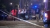 This image provided by WBMA shows bystanders near the scene of a mass shooting in Birmingham, Alabama, Sept. 22, 2024.