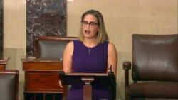 FILE - In this image from Senate Television, Sen. Kyrsten Sinema, D-Ariz., speaks on the floor of the U.S. Senate, Jan. 13, 2022.