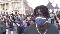 Fidel Nzenzi, pictured near the U.S. Embassy in Paris, says he's protesting against inequality and racism in France. (Lisa Bryant/VOA)