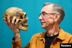 Swedish geneticist Svante Paabo attends a news conference in Leipzig