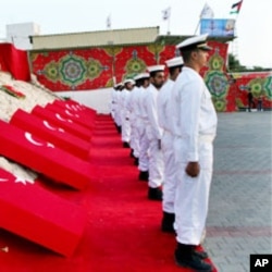 Hamas navy officers are seen during a ceremony honoring the nine Turkish activists killed atop a flotilla aid ship, Gaza City port, June 6, 2010.