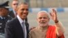 U.S. President Barack Obama, left, shakes hand with Indian Prime Minister Narendra Modi, upon arrival at the Palam Air Force Station in New Delhi, Jan. 25, 2015.