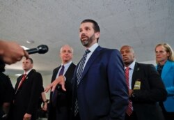 Donald Trump Jr., the son of President Donald Trump, stops to speak to members of the media after having met privately with members of the Senate Intelligence Committee on Capitol Hill, Washington, June 12, 2019.