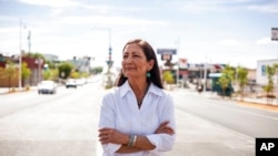 FILE - Deb Haaland poses for a portrait in a Nob Hill Neighborhood in Albuquerque, N.M., June 5, 2018.