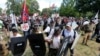 "Alt-right" demonstrators clash with counter-demonstrators at the entrance to Lee Park in Charlottesville, Va., Aug. 12, 2017.