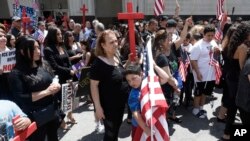 FILE - Iraqis and supporters rally outside the Theodore Levin United States Courthouse in Detroit, Michigan, June 21, 2017.