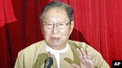 Nyan Win, spokesman of National League for Democracy party, talks to journalists during a press conference at the party's headquarters in Rangoon, Burma, February 20, 2012.