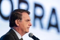 Brazil's President Jair Bolsonaro speaks at the opening of the Brazilian Steel Congress, in Brasilia, Brazil, Aug. 21, 2019.