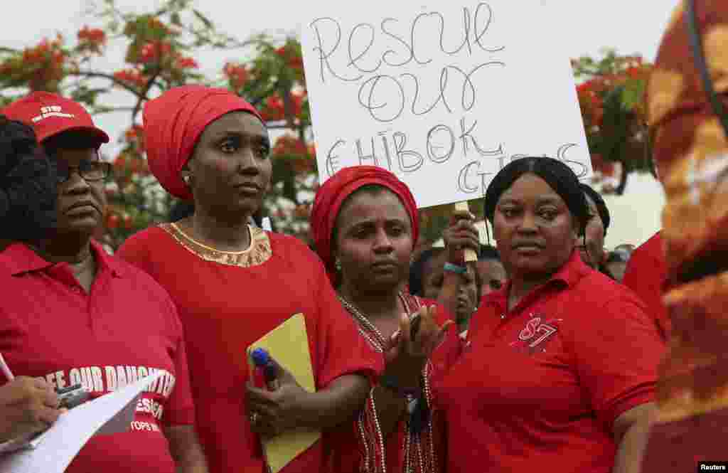 Members of various civil society organisations (CSOs) protest against the delay in securing the release of the abducted schoolgirls who were kidnapped, in Abuja April 30, 2014. Dozens of protesters gathered outside Nigeria's parliament on Wednesday called