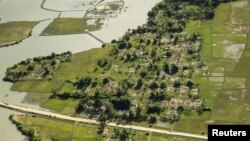 Pemandangan dari udara desa Rohingya yang hangus terbakar dekat Maungdaw di negara bagian Rakhine, Myanmar, 20 September 2018.