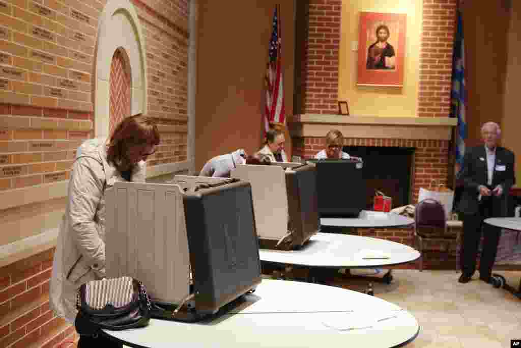 Voters cast their ballots in the Indiana Primary at Holy Trinity Greek Orthodox Church in Carmel, Ind., May 3, 2016. 