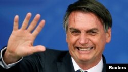 Brazil's President Jair Bolsonaro attends a ceremony at the Planalto Palace in Brasilia, Brazil, April 30, 2019.