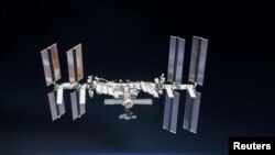 Stasiun Luar Angkasa (ISS) tampak dalam foto yang diambil oleh anggota kru Ekspedisi 56 dari pesawat ruang angkasa Soyuz pada 4 Oktober 2018. (Foto: NASA/Roscosmos/Handout via Reuters)