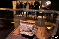 A fragment of a memorial fountain, that was constructed after Feb. 26, 1993 truck bomb attack at the World Trade Center and was destroyed on Sept. 11, 2001, is displayed at the National September 11 Museum, in New York, Feb. 23, 2018.