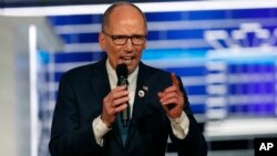 Chair of the Democratic National Committee, Tom Perez, speaks before a Democratic presidential primary debate, Nov. 20, 2019, in Atlanta. 
