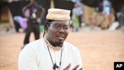 Aristide Tarnagda, the artistic director of Recreatrales, an international theater festival held in Ouagadougou, Burkina Faso, speaks to reporters Oct. 28, 2024.