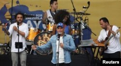 Spanish singer Alejandro Sanz performs in the Venezuela Aid Live concert on the Colombian side of the Tienditas International Bridge near Cucuta, Colombia, on the border with Venezuela, Feb. 22, 2019.