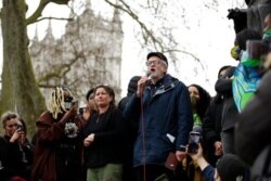 FILE - Former Labor Party leader Jeremy Corbyn addresses demonstrators during a 'Kill the Bill' protest in London, April 3, 2021. The demonstration is against the contentious Police, Crime, Sentencing and Courts Bill going through Parliament.