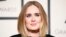 Singer Adele arrives at the 58th Grammy Awards in Los Angeles, California, Feb. 15, 2016. 