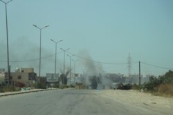 An airstrike hits a Tripoli suburb July 7, 2019, as forces loyal to the Government of National Accord in the west battled forces loyal to Khalifa Haftar, the eastern de-facto leader who has vowed to take the Libyan capital by force. (H. Murdock/VOA)