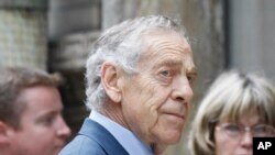 FILE - "60 Minutes" correspondent Morley Safer arrives for Walter Cronkite's funeral at St. Bartholomew's Church on Park Avenue in New York, July 23, 2009. Safer died in May 2016.