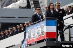Taiwan President Tsai Ing-wen visits Panshi fast combat support ship during her trip at a navy base in Kaohsiung, Taiwan, March 21, 2017.