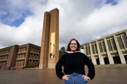 Sophie Corroon, a sophomore at the University of Washington, poses for a photo on the school's campus Monday, Jan. 25, 2021, in Seattle.
