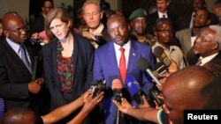 Samantha Power, the United States' U.N. ambassador, and Burundian President Pierre Nkurunziza speak to reporters in Gitega, Burundi, Jan. 22, 2016.
