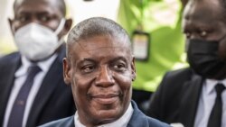 FILE - Minister of the Interior and Territorial Communities Liszt Quitel sits during a ceremony at La Primature in Port-au-Prince, Haiti, on July 20, 2021.