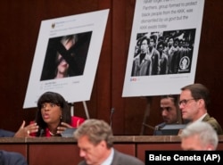 Representative Terri Sewell of Alabam, left, with Representative Jim Himes of Connecticut, right, questions leaders from Facebook, Twitter and Google.