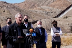 FILE - House Minority Leader Kevin McCarthy speaks to the press during a tour for a delegation of Republican lawmakers of the U.S.-Mexico border, in El Paso, Texas, March 15, 2021.