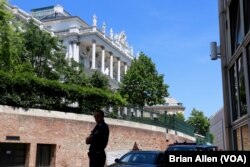 A police officer outside the Palais Coburg where closed-door nuclear talks with Iran take place in Vienna, Austria, July 4, 2015.