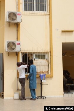 Patients collect their daily dose of methadone at Dakar's drug rehabilitation facility, the only center administering the medication in West Africa, June 19, 2018.