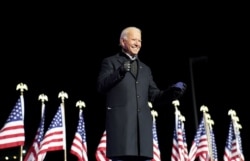 Democratic U.S. presidential nominee and former Vice President Joe Biden smiles during a drive-in campaign rally at Heinz Field in Pittsburgh, Pennsylvania, U.S., November 2, 2020. REUTERS/Kevin Lamarque