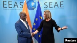 EU High Representative for Foreign Affairs Federica Mogherini welcomes Niger's Foreign Minister Kalla Ankourao before a G-5 Sahel Ministerial meeting at the EU headquarters in Brussels, Belgium, June 18, 2018. 