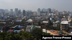 FILE - A general view shows residential and commercial buildings in the Cambodian port city of Sihanoukville on Feb. 20, 2020. 