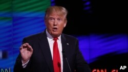 Kandidat Capres AS dari Partai Republik, Donald Trump dalam debat di University of Miami, Coral Gables, Florida (10/3).